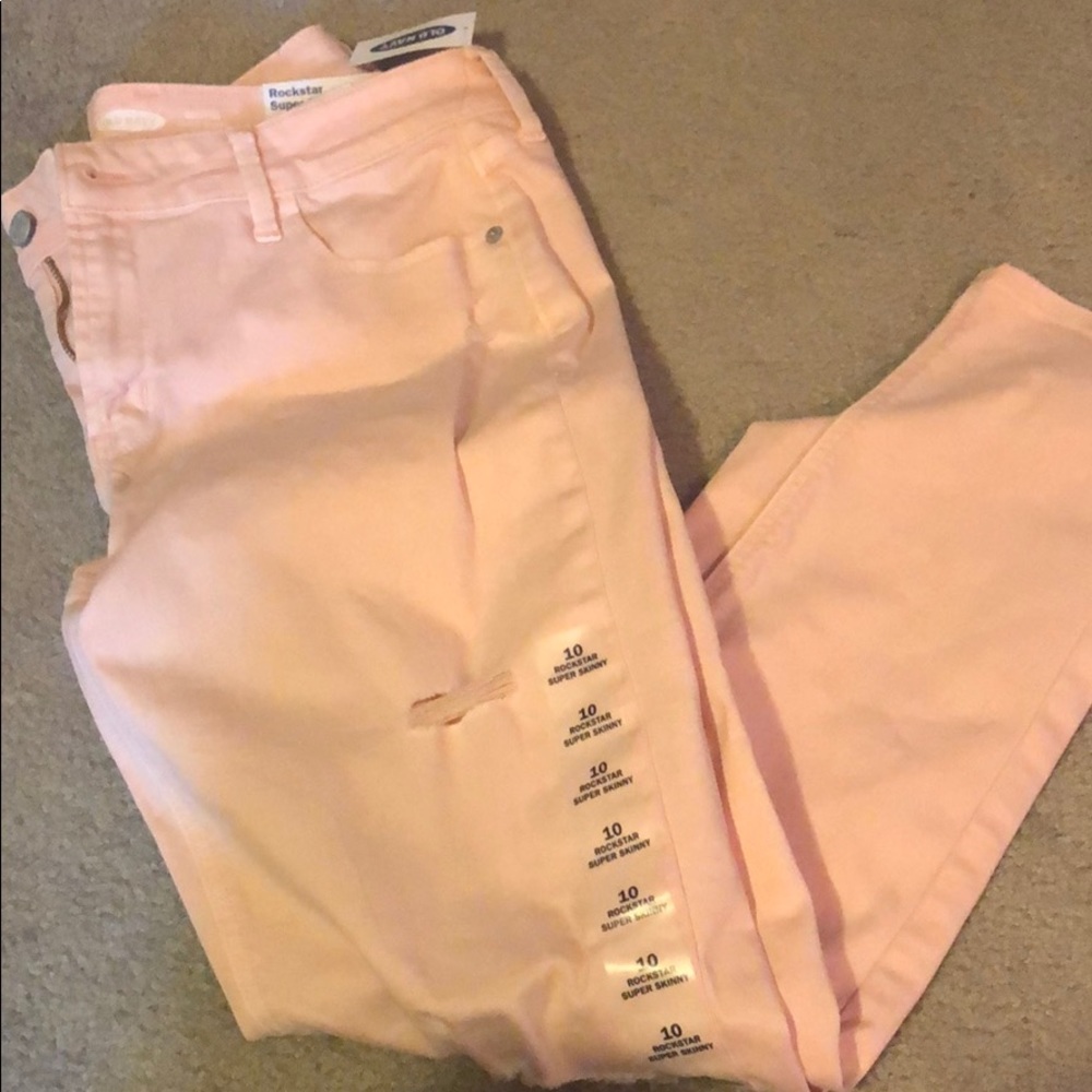Light pink ripped jeans